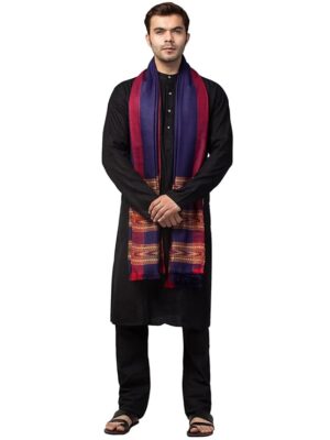 A man faces forward in a black kurta pajama and sandals, draped with the aruna kullu handloom Men shawl Kullu Wool lohi Genuine Hand Woven for Men 3 Patti blue. The background is plain white.
