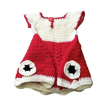 Aruna Kullu Handloom's woolen baby FROCK for 0–12 months features a red and white crochet design, cap sleeves, a buttoned neckline, and two black-and-white star patterns near the hem.