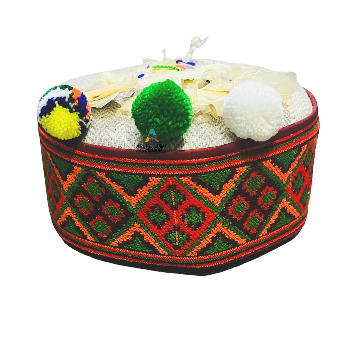 himachali topi green and yellow with flower on top 350.00 aruna kullu handloom