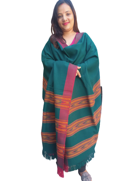 A woman smiles, wearing the aruna kullu handloom ANGORA Shawl for women, featuring beautiful triple border Kullu weaving, against a plain white background.