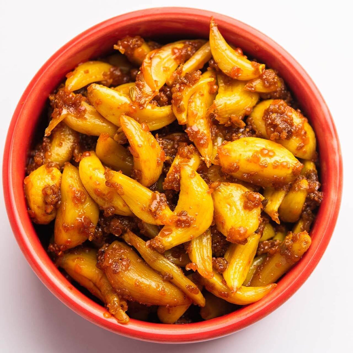 Jar of homemade organic garlic pickle, lehsun ka achar.