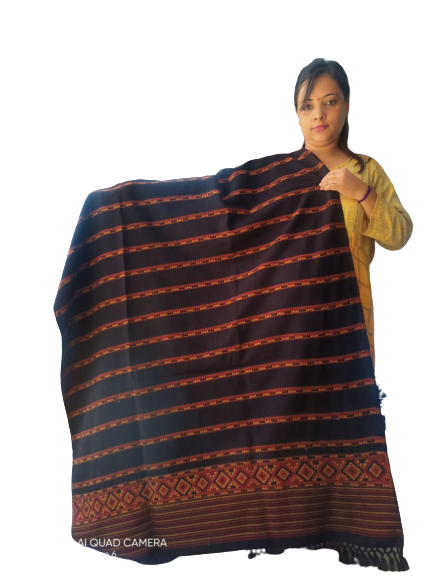 A woman in a yellow sweater displays the aruna kullu handloom Hand Woven PASHMINA BLACK Shawl, featuring red and orange stripes and an embroidered geometric border, against a plain white background.