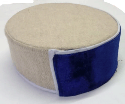The kullu topi VELVET BLUE KULLU TOPI by aruna kullu handloom is a round, beige Himachali cap featuring a dark blue velvet side, shown against a white background.
