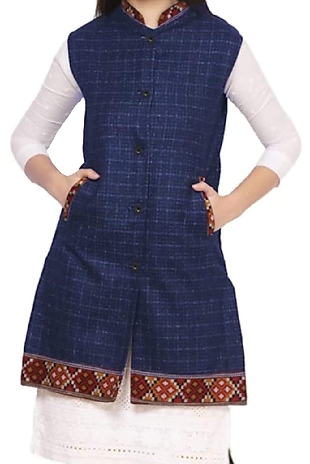A woman wears the ARUNA KULLU HANDLOOM Woolen Winter Wear Long Jacket for Women in blue checks, inspired by Himachali tradition, with embroidered red and white borders, front buttons, and pockets from aruna kullu handloom.