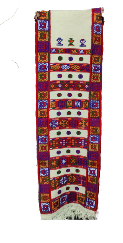 kinnauri muffler online men woolen muffler Himachal muffler online Himachal muffler kinnauri muffler The Pure Wool Original Kullu Kinnauri Muffler White by Aruna Kullu Handloom features colorful geometric and animal motifs with red, purple, and orange borders handwoven on a cream background.