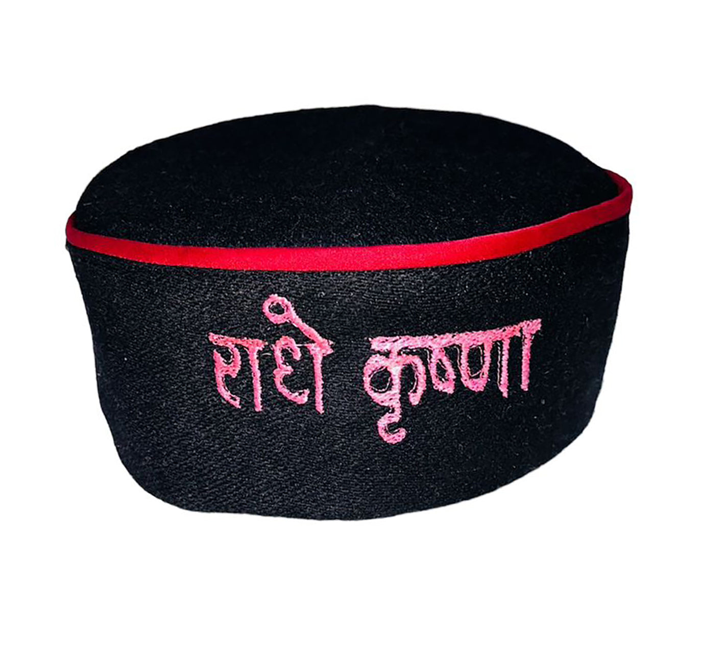 The aruna kullu handloom Pahadi cap online Himachali Patti Woolen Topi features a black design with a red border and pink embroidered Hindi text "राधे कृष्णा", inspired by the traditional Himachal Pradesh cap.