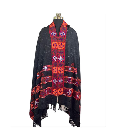 The aruna kullu handloom Women's Yak Wool Kullu Kinnuari Triple Border Kullu Shawl in black, featuring intricate red and purple embroidery and fringed edges, is draped over a dress form against a plain white background.
