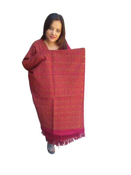 A woman with straight brown hair holds a large maroon aruna kullu handloom Hand Woven PASHMINA Shawl, beautifully embroidered for women, featuring intricate patterns and fringe at the bottom against a plain white background.
