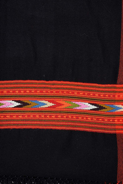 A close-up of the aruna kullu handloom Women’s Hand Woven Woolen Stole with Kullu Typical Weaving on Handloom in BLACK, featuring delicate embroidery—a perfect choice among woolen stoles for women.