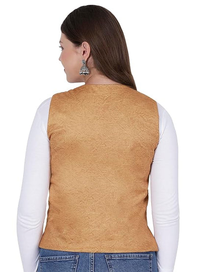 A woman with long brown hair, shown from the back, wears an Aruna Kullu Handloom Nehru jacket for women with embroidery work in yellow over a white long-sleeve shirt and blue jeans, accessorized with large silver earrings.