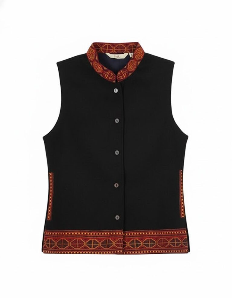 The aruna kullu handloom himachali traditional jacket is a sleeveless black woolen winter wear for women, featuring a stand collar, button-down front, and red-orange geometric embroidery—perfect for pairing with Indian ethnic outfits.